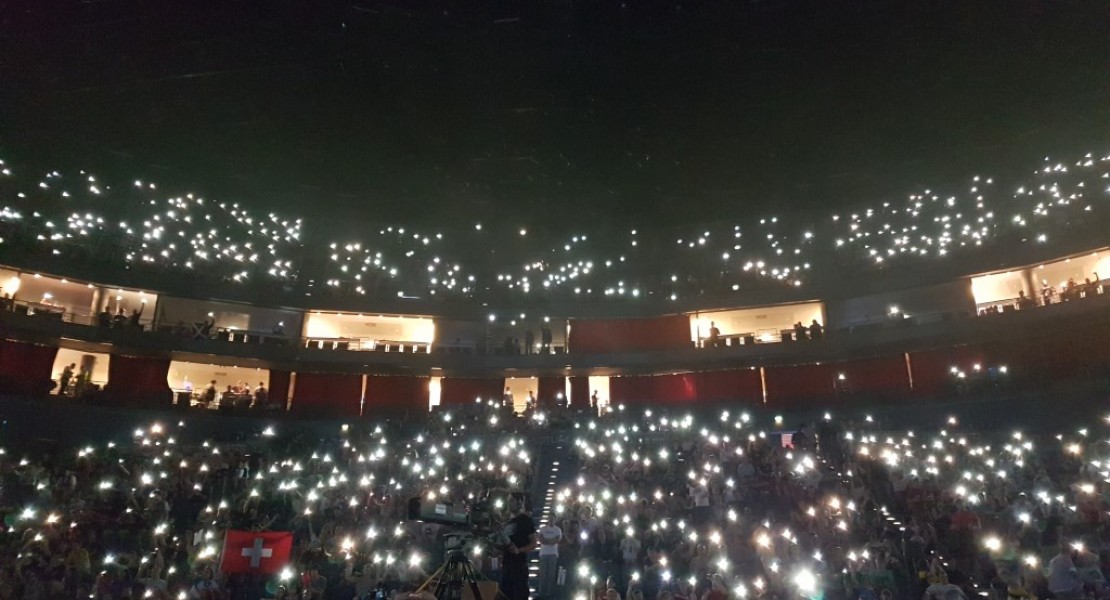 A picture of stadium crowd with everyone holding their phone lights in the air. Looked very pretty.